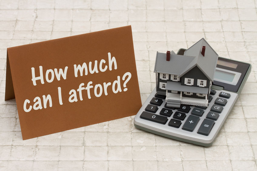 Home Mortgage Affordability, A gray house, brown card and calcul